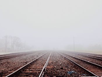 Railroad track in foggy weather