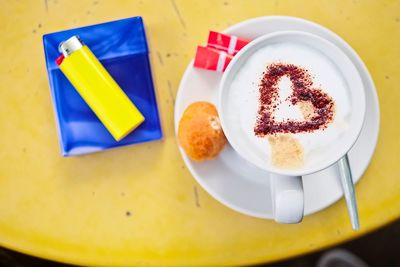 Close-up of coffee cup on table