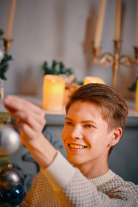 Portrait of smiling man holding ice cream