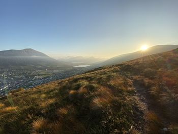Scenic view of landscape against sky during sunset