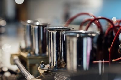 Close-up of objects in row at market stall