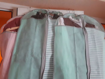 Close-up of clothes hanging on rack