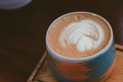 High angle view of cappuccino on table