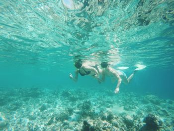 Man swimming in sea