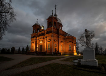 View of historic building against cloudy sky