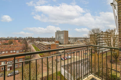 Buildings in city against sky