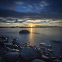 Scenic view of sea at sunset