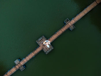 High angle view of pipe by sea