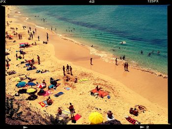 People enjoying at beach