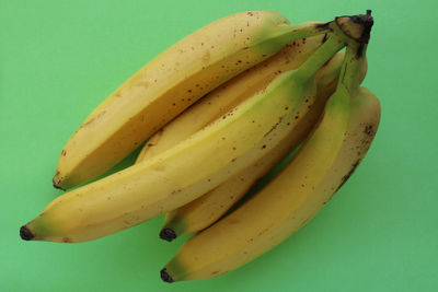 High angle view of bananas against blue background