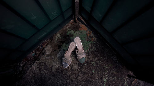 High angle view of man relaxing in abandoned building