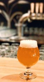 Close-up of beer in glass on table