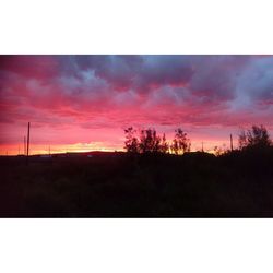 Scenic view of silhouette landscape against sky during sunset