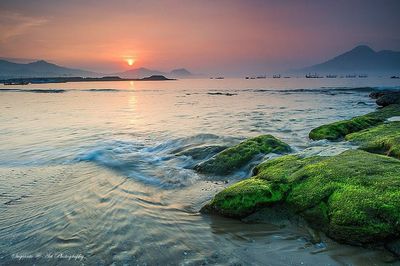 Scenic view of sunset over sea