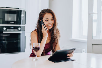 Young woman using mobile phone