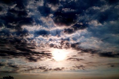 Low angle view of clouds in sky during sunset