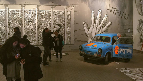 People standing on floor at night