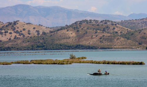 Scenic view of lake against mountains