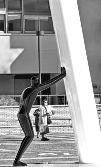 People walking on staircase of building