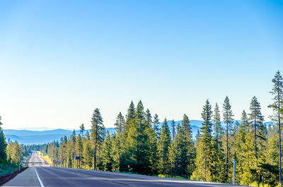 Empty road against clear sky