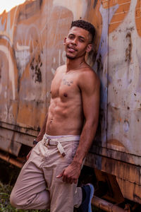 Portrait of young man standing outdoors