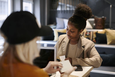 Woman working in cafe