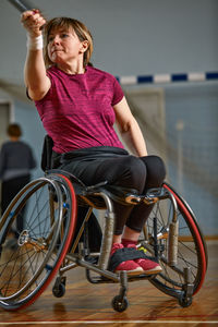 Portrait of boy sitting on wheelchair