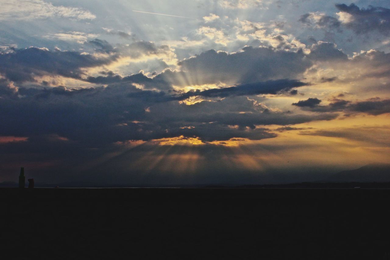 scenics, sunset, tranquil scene, beauty in nature, sky, tranquility, cloud - sky, silhouette, idyllic, nature, landscape, cloud, cloudy, dramatic sky, orange color, majestic, cloudscape, weather, atmospheric mood, sea