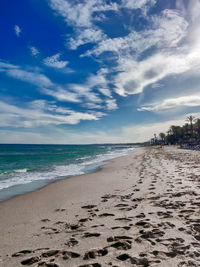 Scenic view of beach against sky