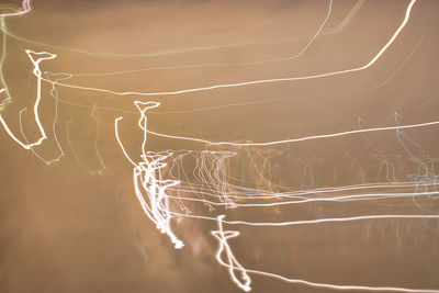 Close-up of light trails at night