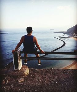 Man sitting on beach