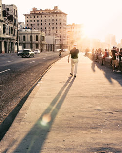 People on road in city