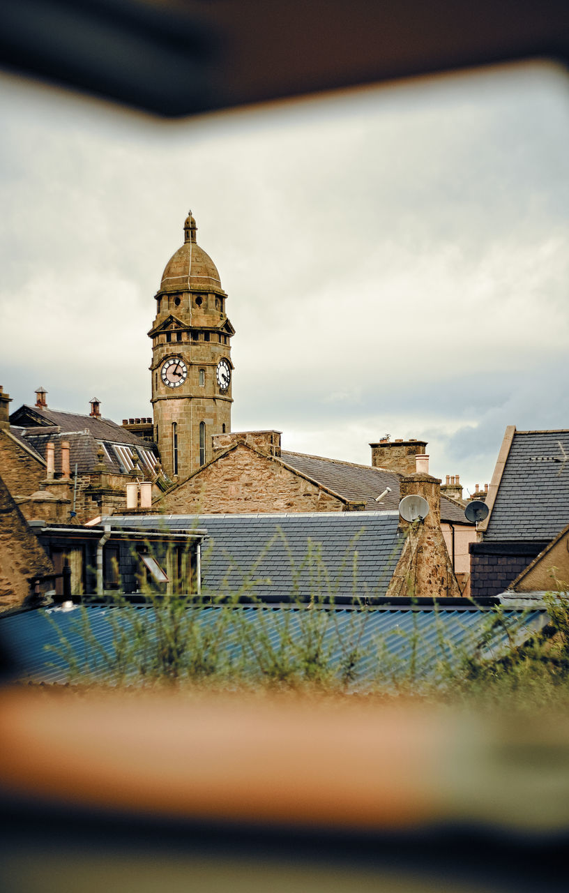 BUILDINGS AGAINST SKY