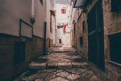 Narrow alley along buildings