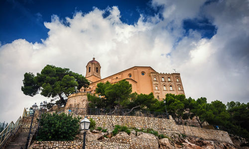 View from below on the stairs of the castle of cullera