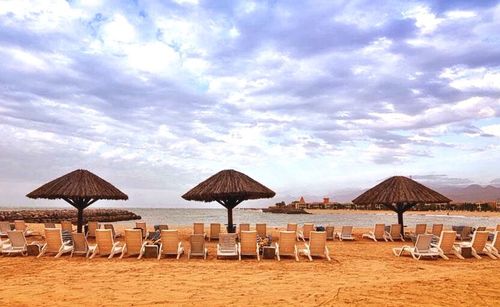 Scenic view of beach against sky