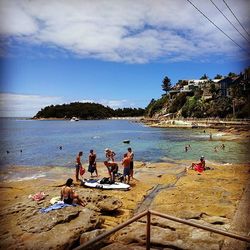 Woman sitting on beach