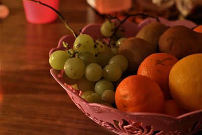 Close-up of grapes on table