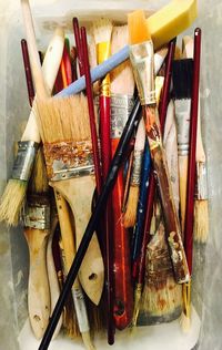 Close-up of paintbrushes on table