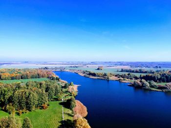 High angle view of river against clear blue sky