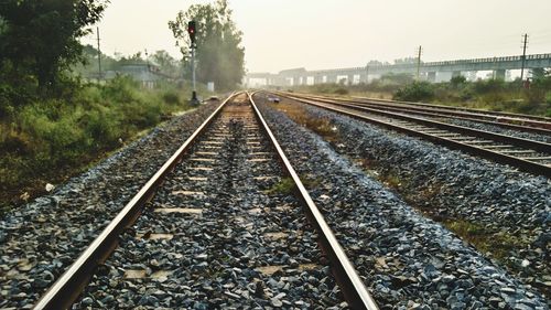 Railroad tracks against clear sky