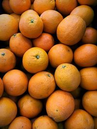 Full frame shot of oranges in market