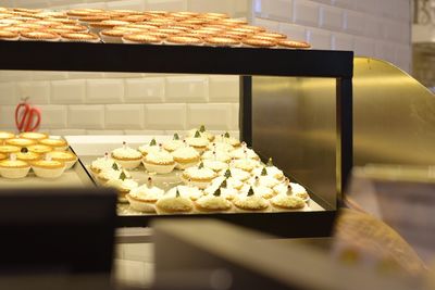 Close-up of cupcakes on cutting board