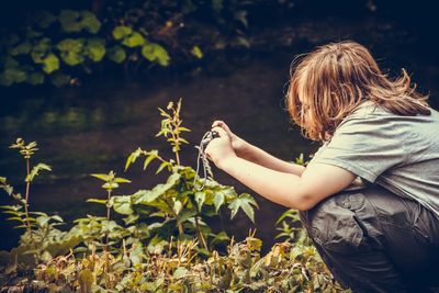 Woman holding plant