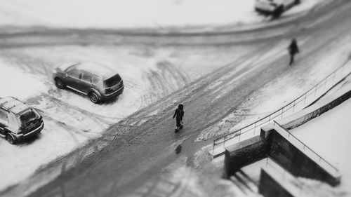 High angle view of people on road during winter