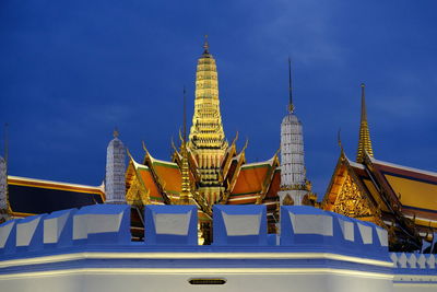 Low angle view of temple against blue sky