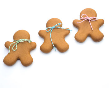 Close-up of cookies against white background