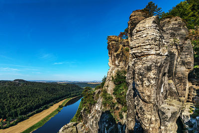 Panoramic view of rock formations against sky