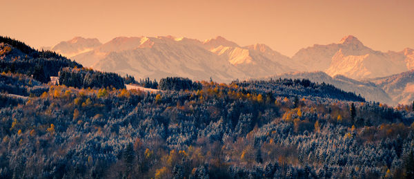 Scenic view of mountains against sky during sunset