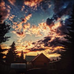 Scenic view of dramatic sky at sunset